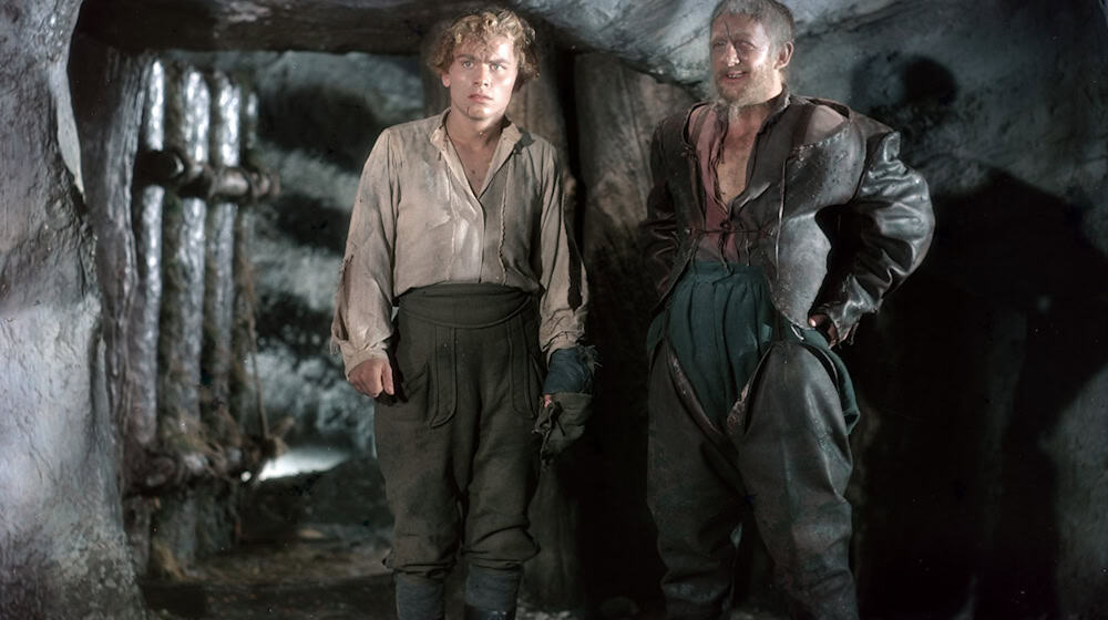 Die Schauspieler Lutz Moik (l) in der Figur des Köhlers Peter Munk und Erwin Geschonnek als Holländer-Michel in der Märchen-Verfilmung «Das kalte Herz». / Foto: Kilian, Klawikowski/DEFA-Stiftung/dpa