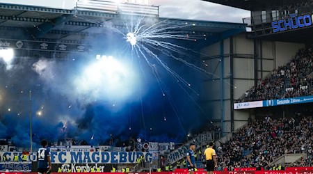 Der 1. FC Magdeburg muss einen sechsstelligen Betrag für das Verhalten seiner Anhänger zahlen. (Archivbild) / Foto: Marius Becker/dpa