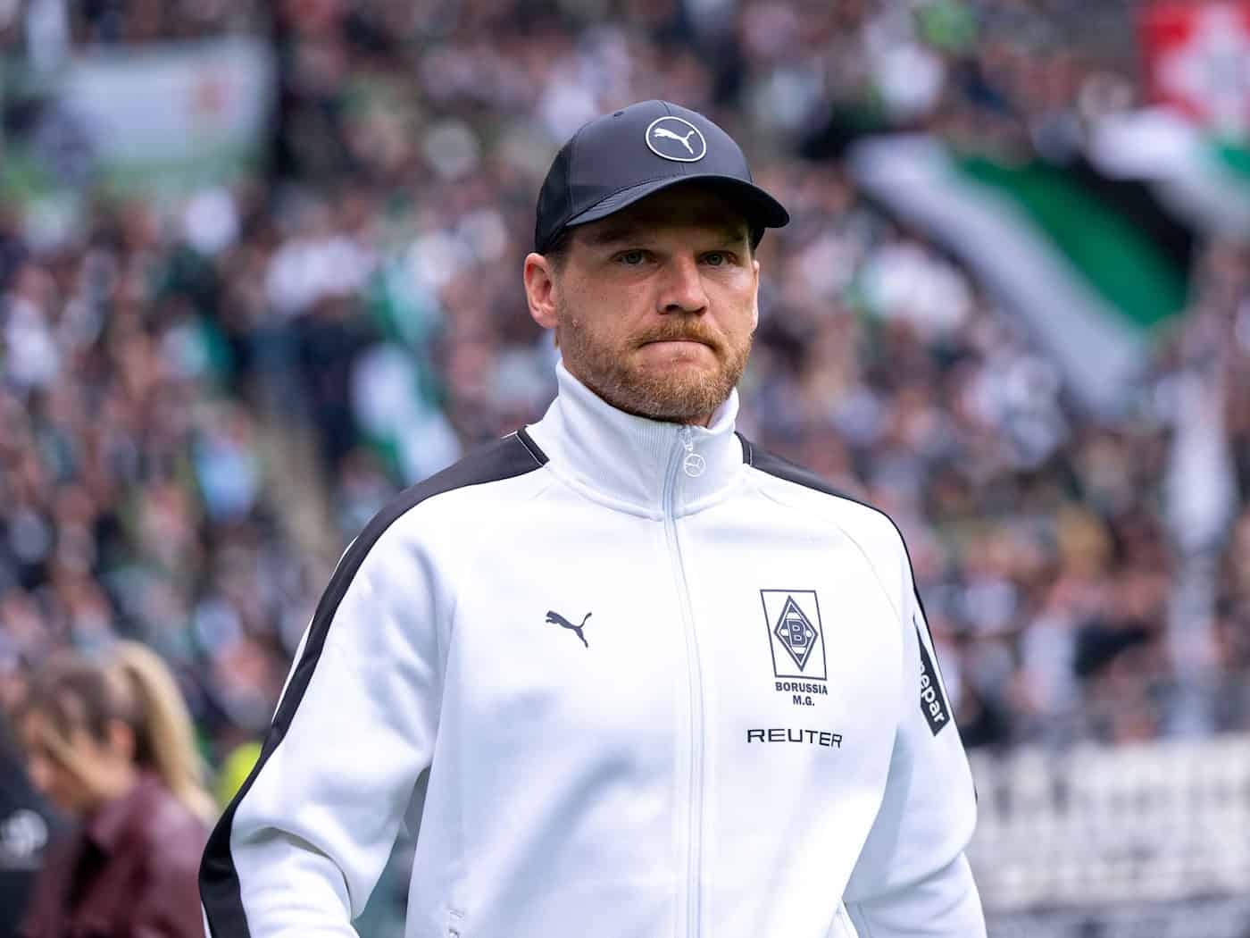 Trainer Eugen Polanski verzichtet auf Werbung für seine Zukunft bei Gladbach. (Archivbild)  / Foto: David Inderlied/dpa