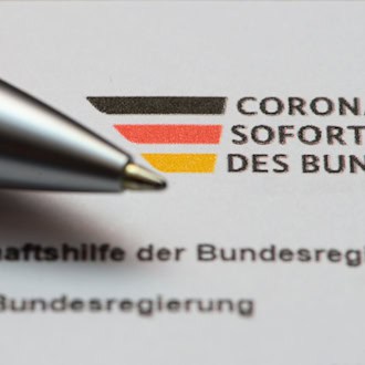 Thüringer Unternehmen müssen Millionenbeträge an Corona-Hilfen zurückzahlen (Archivbild).  / Foto: Robert Michael/dpa-Zentralbild/dpa