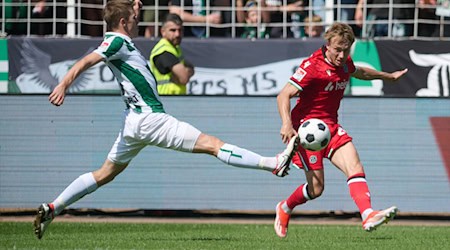 Das Duell zwischen Aufsteiger Münster und Hannover war lange Zeit umkämpft.   / Foto: Bernd Thissen/dpa