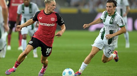 Rocco Reitz (l) könnte gegen Bremen in die Mannschaft zurückkehren. / Foto: Federico Gambarini/dpa