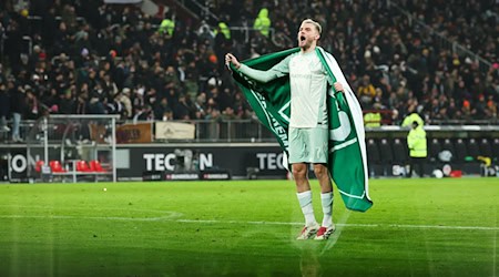 Kann Football-Legende Tom Brady Werder-Stürmer Marvin Ducksch auf die Insel lotsen? / Foto: Christian Charisius/dpa