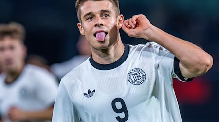 U21-Nationalspieler Nicolo Tresoldi jubelt über seinen Treffer zum 3:0 gegen Lettland.  / Foto: Jens Büttner/dpa