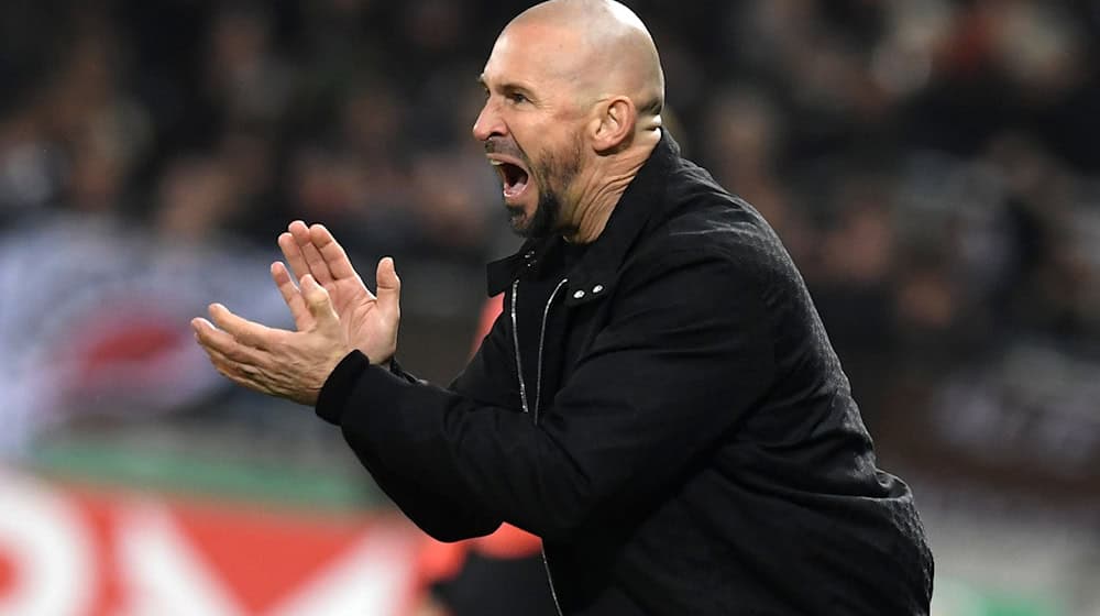 Ist nach dem Pokal-Aus mit der TSG Hoffenheim in Wolfsburg gefordert: Trainer Christian Ilzer. / Foto: Daniel Bockwoldt/dpa Ist nach dem Pokal-Aus mit der TSG Hoffenheim in Wolfsburg gefordert: Trainer Christian Ilzer. / Foto: Daniel Bockwoldt/dpa