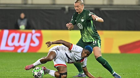Voller Einsatz für den VfL Wolfsburg: Alexandra Popp (r). / Foto: Swen Pförtner/dpa