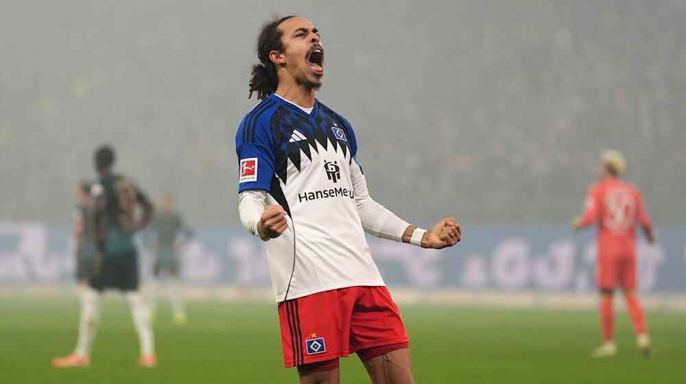 Bejubelt sein Siegtor gegen Werder Bremen: Yussuf Poulsen vom Hamburger SV. / Foto: Marcus Brandt/dpa