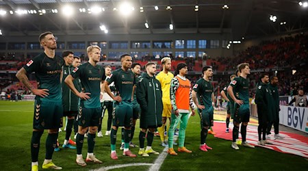 Gesichter einer Krise: die Bremer Profis müssen den Frust der Fans ertragen. / Foto: Philipp von Ditfurth/dpa