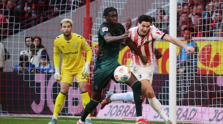Karim Coulibaly (M) wird Werder Bremen im Kellerduell auf St. Pauli. (Archivbild) / Foto: Philipp von Ditfurth/dpa