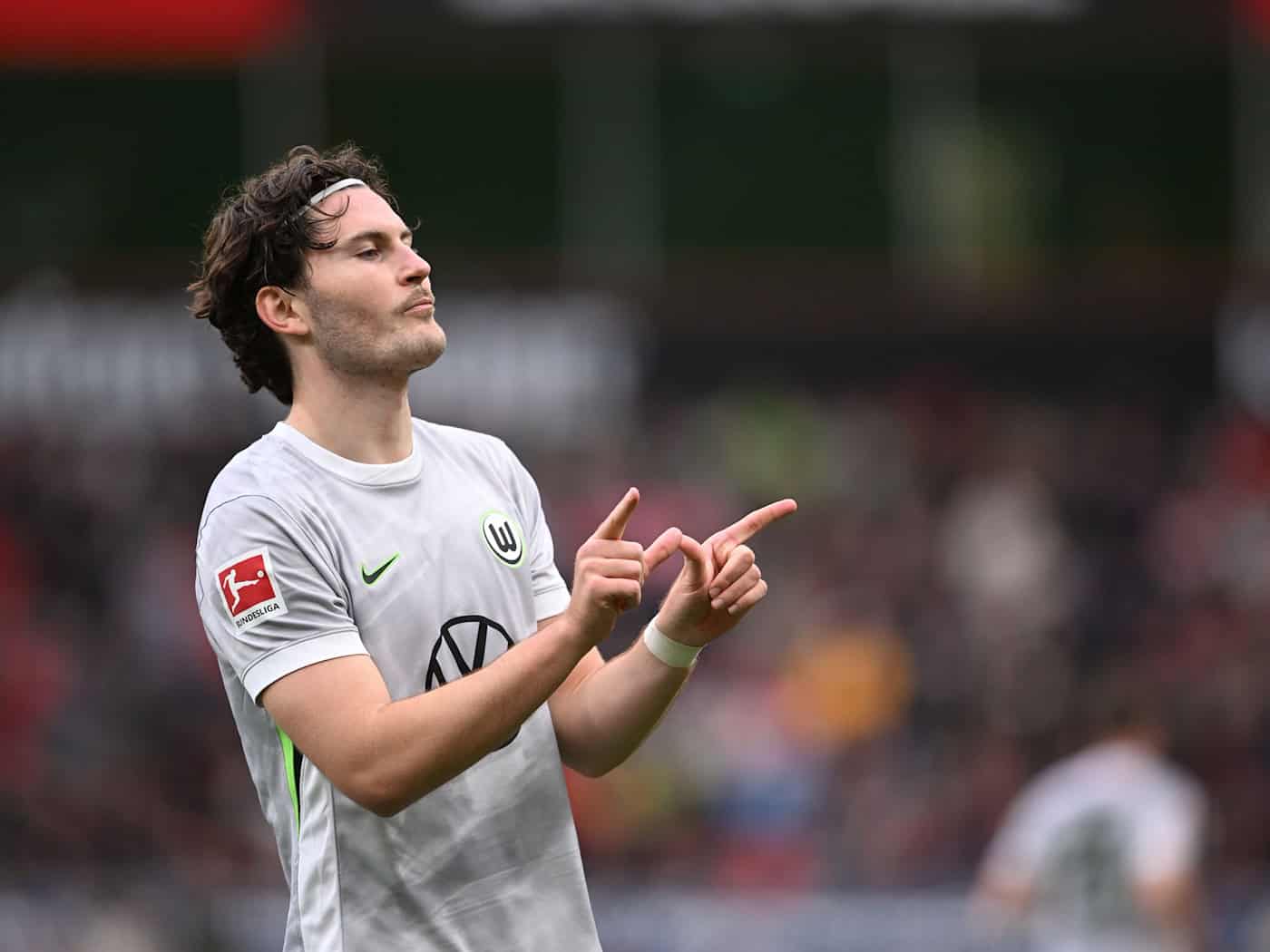 Jonas Wind fällt beim VfL Wolfsburg einige Wochen lang aus. (Archivbild) / Foto: Fabian Strauch/dpa