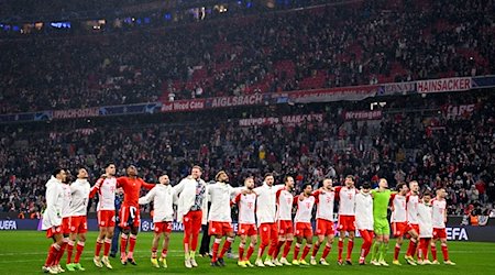 Die Bayern-Spieler jubeln nach dem 3:0-Sieg. / Foto: Tom Weller/dpa