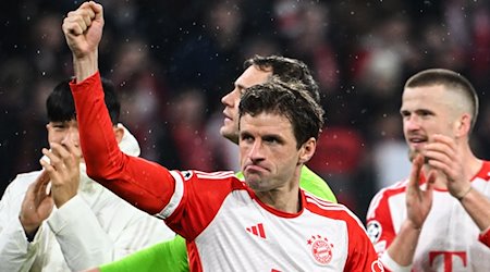Münchens Thomas Müller jubelt nach dem Spiel. / Foto: Sven Hoppe/dpa