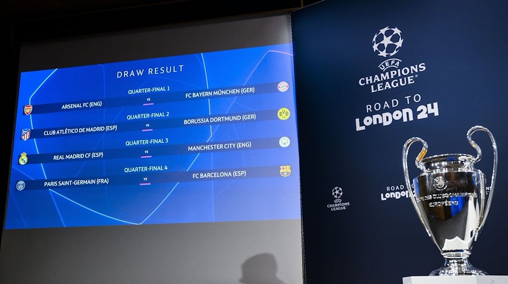 Der Spielplan der Champions League mit den deutschen Vereinen FC Bayern München und Borussia Dortmund wird während der Viertelfinalauslosung der UEFA Champions League 2023/24 im UEFA-Hauptquartier angezeigt. / Foto: Jean-Christophe Bott/KEYSTONE/dpa