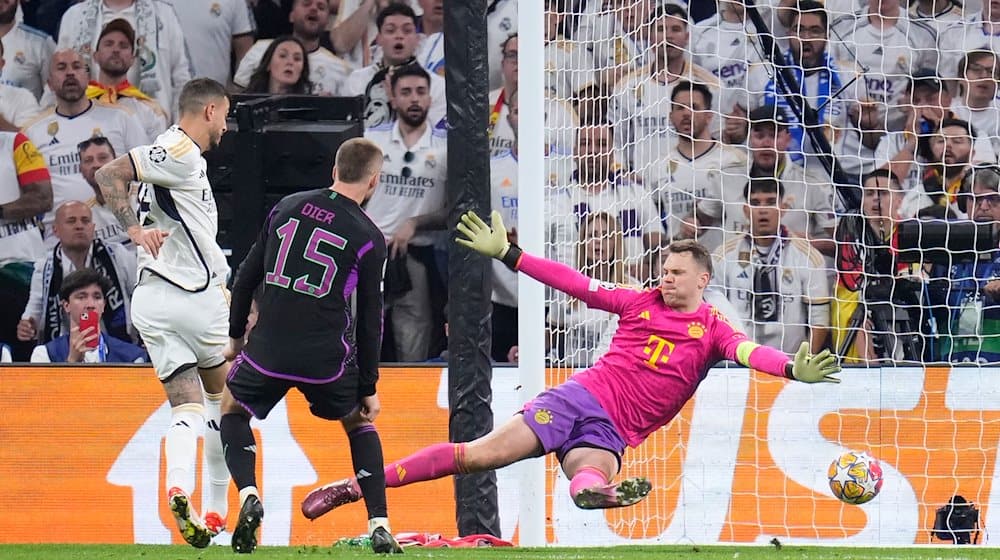 Joselu (l) von Madrid trifft zum 1:1. / Foto: Manu Fernandez/AP