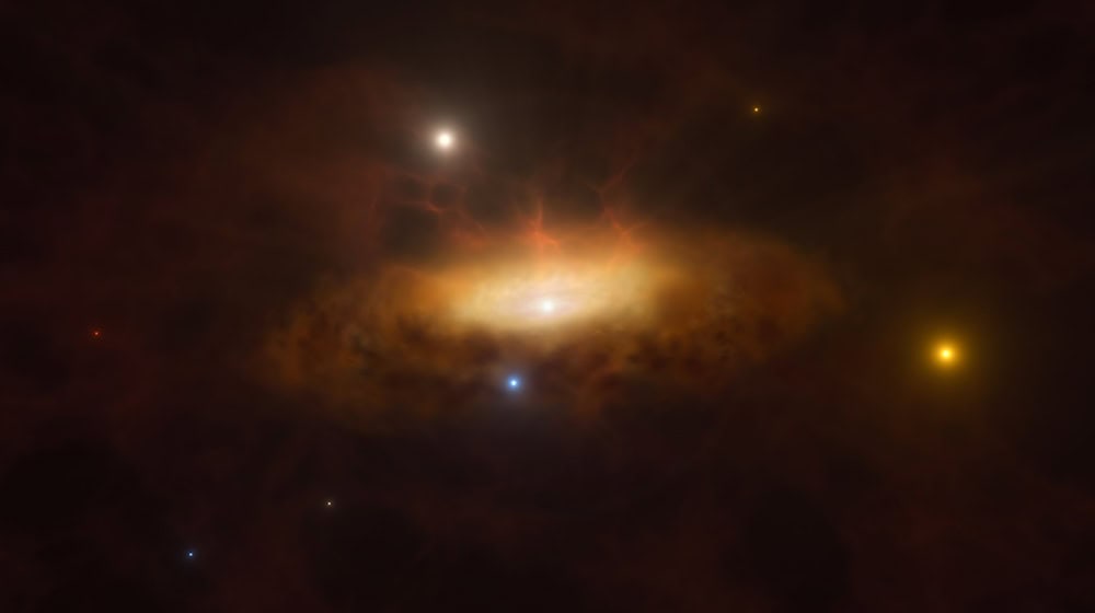 Künstlerische Darstellung: Die Galaxie SDSS1335+0728 leuchtet auf. / Foto: -/ESO/dpa