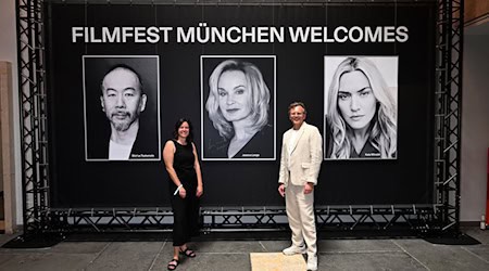 Filmfest München: Die künstlerische Co-Leiterin Julia Weigl und Christoph Gröner zeigen sich zufrieden zum Ende des Festivals. / Foto: Felix Hörhager/dpa