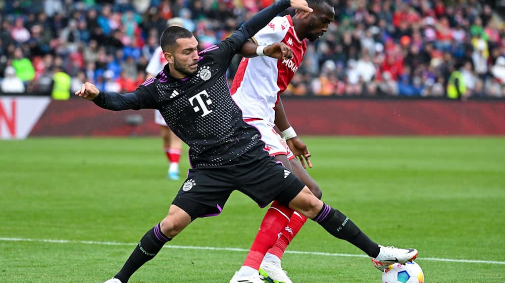 Chrislain Matsima (r) wechselt zum FC Augsburg. / Foto: Sven Hoppe/dpa