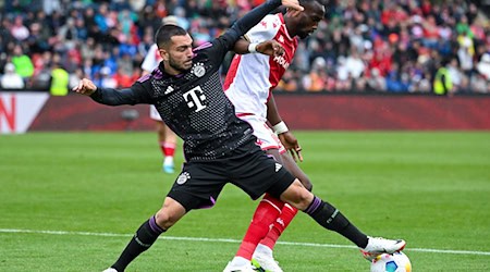 Chrislain Matsima (r) wechselt zum FC Augsburg. / Foto: Sven Hoppe/dpa