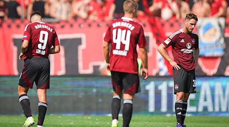 Frust pur bei den Spielern des 1. FC Nürnberg. / Foto: Daniel Karmann/dpa