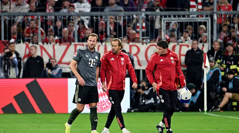 Harry Kane (l) musste gegen Leverkusen ausgewechselt werden. / Foto: Lukas Barth-Tuttas/dpa