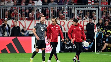 Harry Kane (l) musste gegen Leverkusen ausgewechselt werden. / Foto: Lukas Barth-Tuttas/dpa