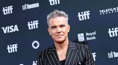 Robbie Williams bekommt seinen dritten Bambi. (Archivbild) / Foto: Christopher Katsarov/The Canadian Press/AP/dpa