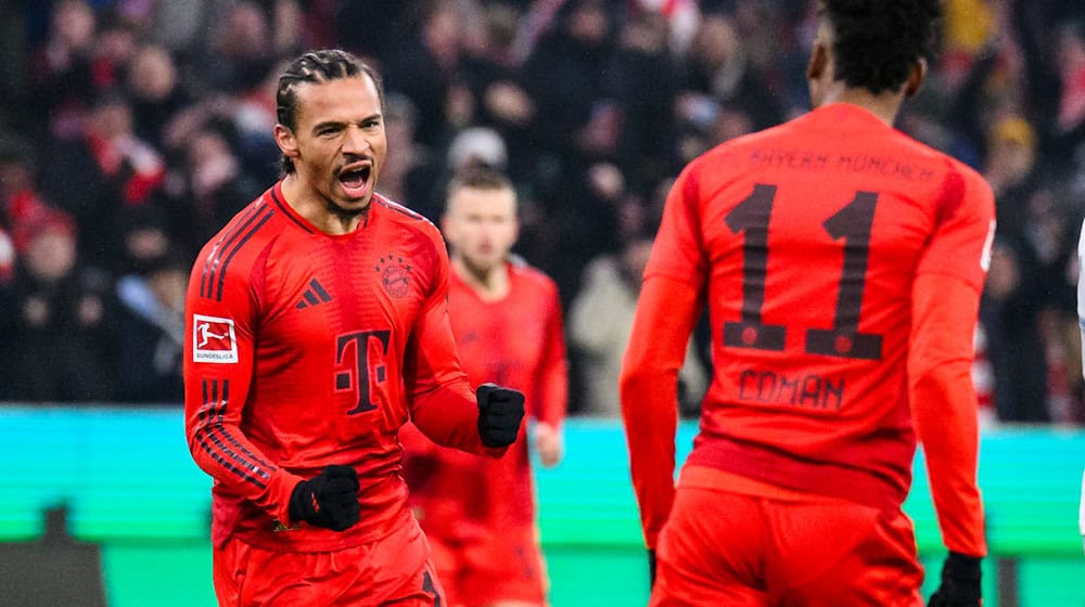 Torschütze zum 1:0 - Leroy Sané (l). / Foto: Tom Weller/dpa