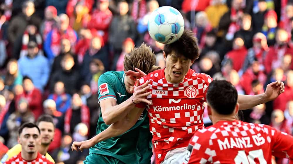 Der FSV Mainz 05 und der FC Augsburg lieferten sich ein umkämpftes Duell. / Foto: Torsten Silz/dpa