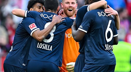 Bochumer Glückseligkeit in München, mittendrin der bärenstark haltende Torwart Timo Horn. / Foto: Sven Hoppe/dpa