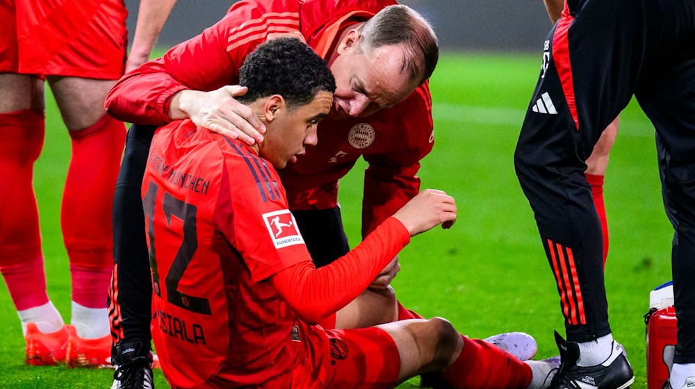 Jamal Musiala bei seiner Verletzung in Augsburg. / Foto: Tom Weller/dpa