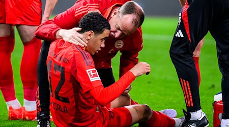 Jamal Musiala bei seiner Verletzung in Augsburg. / Foto: Tom Weller/dpa