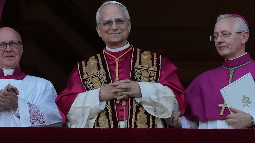 Weltweit reagierten Staatsoberhäupter auf die Wahl Prevosts zum neuen Papst.  / Foto: Andrew Medichini/AP/dpa