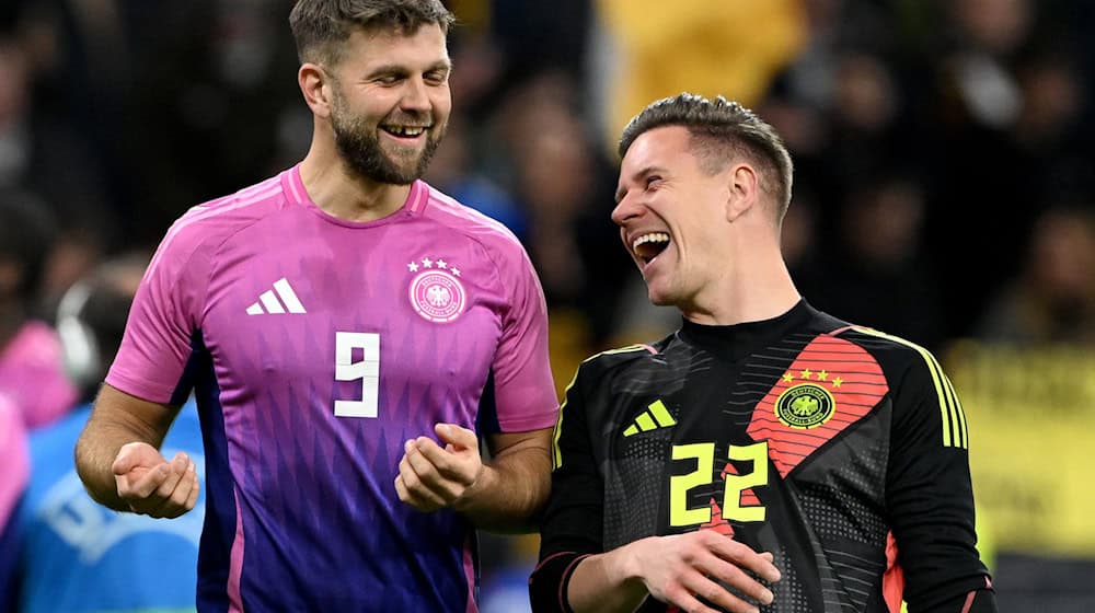 Prominentes DFB-Duo vor der Rückkehr? Torjäger Niclas Füllkrug (l) und Torwart Marc-André ter Stegen. / Foto: Federico Gambarini/dpa