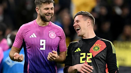 Prominentes DFB-Duo vor der Rückkehr? Torjäger Niclas Füllkrug (l) und Torwart Marc-André ter Stegen. / Foto: Federico Gambarini/dpa