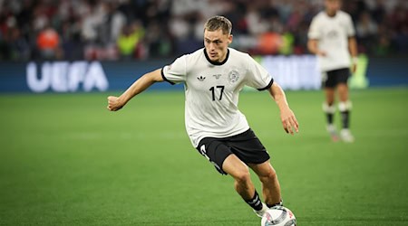 Ein Gespräch mit Red-Coach Arne Slot überzeugte Florian Wirtz vom Wechsel nach Leverkusen / Foto: Christian Charisius/dpa