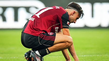 Riesenenttäuschung beim 1. FC Nürnberg nach der späten Niederlage. / Foto: Daniel Karmann/dpa