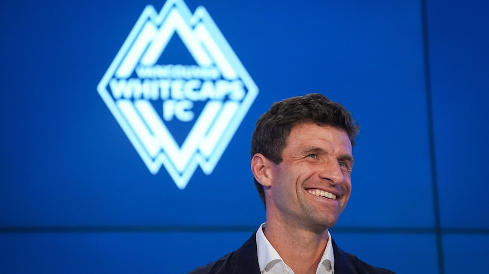 Müller hatte Spaß bei seiner Vorstellung und platzierte auch auf Englisch seine Scherze. / Foto: Darryl Dyck/Canadian Press via ZUMA Press/dpa