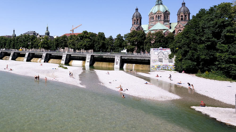 Abkühlung gefällig? In der Isar in München ist das möglich.  / Foto: Sven Hoppe/dpa
