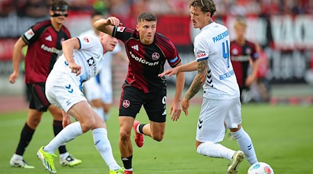 Der 1. FC Nürnberg hat den ersten Punkt in dieser Zweitliga-Saison erkämpft. / Foto: Daniel Karmann/dpa