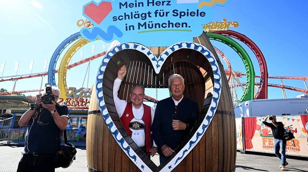 Die Stadt wirbt auch auf dem Oktoberfest um Zustimmung zu ihrer Olympiabewerbung - zum Ärger der Gegner (Archivbild). / Foto: Felix Hörhager/dpa Die Stadt wirbt auch auf dem Oktoberfest um Zustimmung zu ihrer Olympiabewerbung - zum Ärger der Gegner (Archivbild). / Foto: Felix Hörhager/dpa