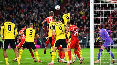 Harry Kane (hinten, Mitte l) brachte den FC Bayern früh in Führung. / Foto: Sven Hoppe/dpa