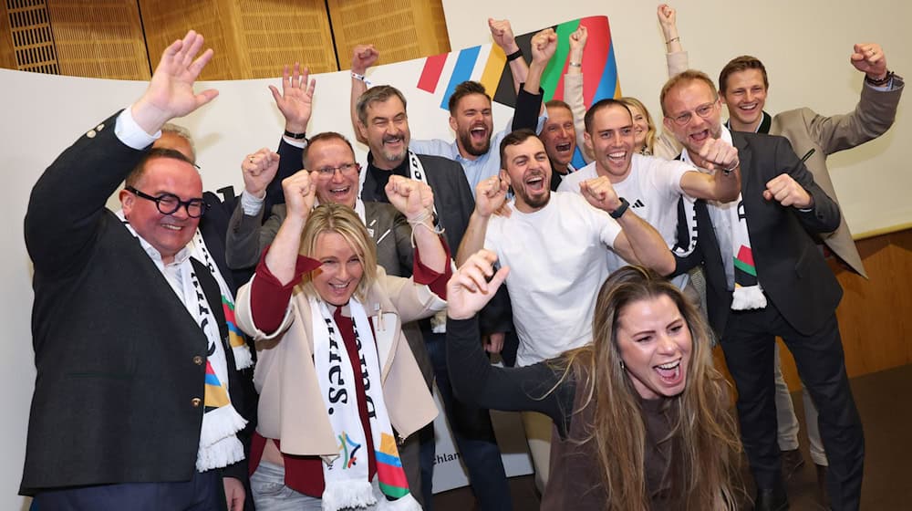 Jubel nach einem klaren Votum: Die Befürworter freuen sich über das Ja zur Münchner Olympia-Bewerbung. / Foto: Karl-Josef Hildenbrand/dpa