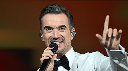 Florian Silbereisen will bei seiner Silvestershow wieder etliche Sänger aus dem In- und Ausland begrüßen. (Archivbild) / Foto: Hendrik Schmidt/dpa