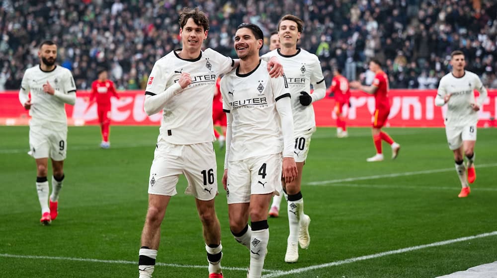 Sander und Diks freuen sich über die frühe Führung. / Foto: Marius Becker/dpa