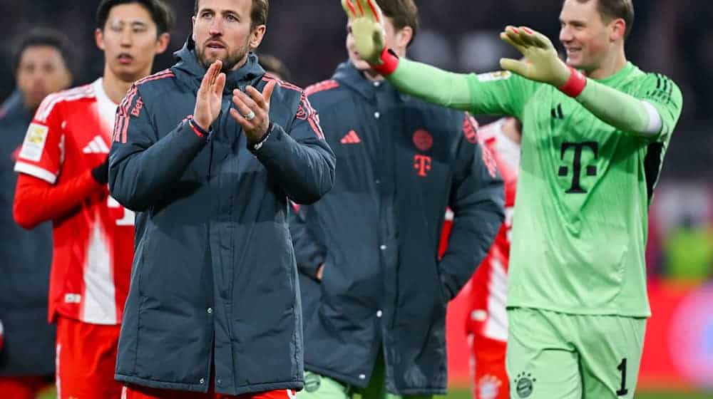 Verlängern sie beim FC Bayern? Harry Kane (l) und Manuel Neuer (r). (Archivbild) / Foto: Sven Hoppe/dpa