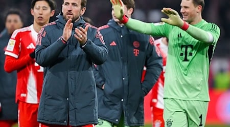 Verlängern sie beim FC Bayern? Harry Kane (l) und Manuel Neuer (r). (Archivbild) / Foto: Sven Hoppe/dpa