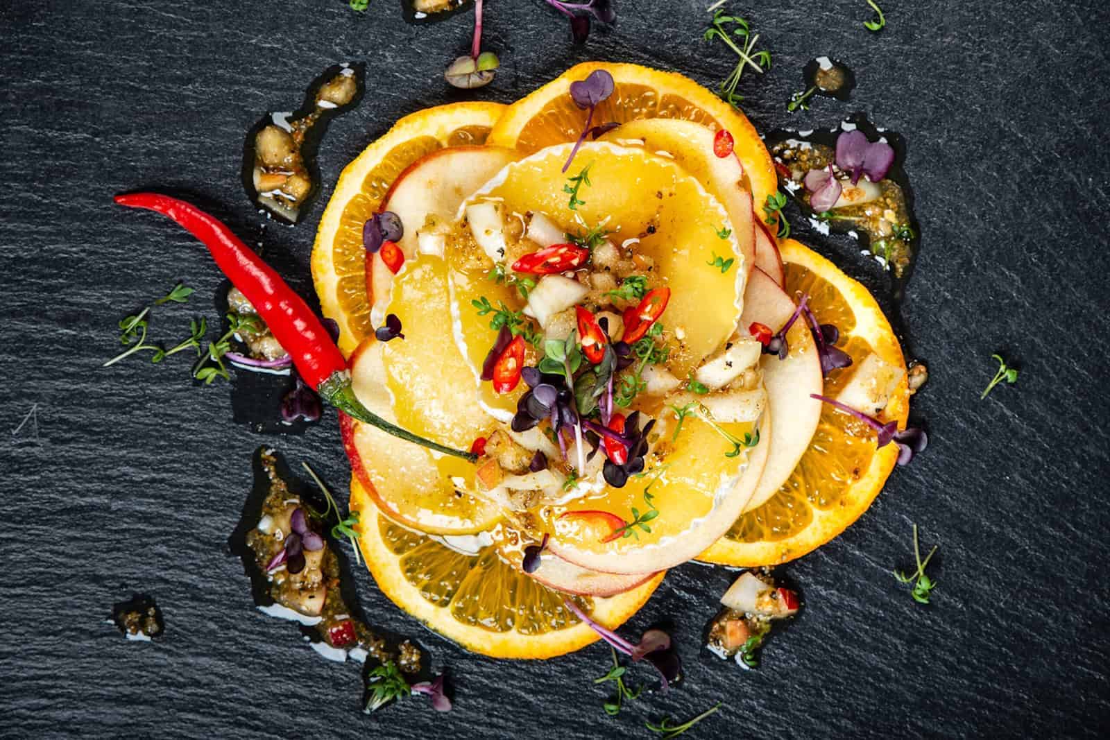 Handkäse auf Orangen