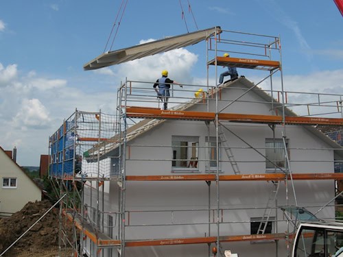 A construction company working on a new residential building.