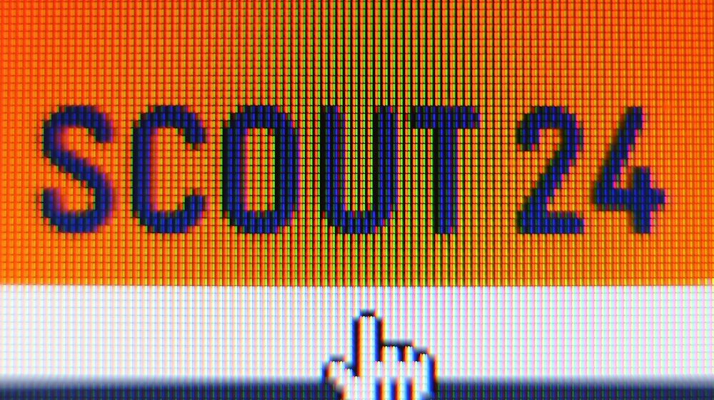 Das Logo des Online-Marktplatzbetreibers Scout24 auf einem Computerbildschirm. / Foto: Karl-Josef Hildenbrand/dpa/Archivbild