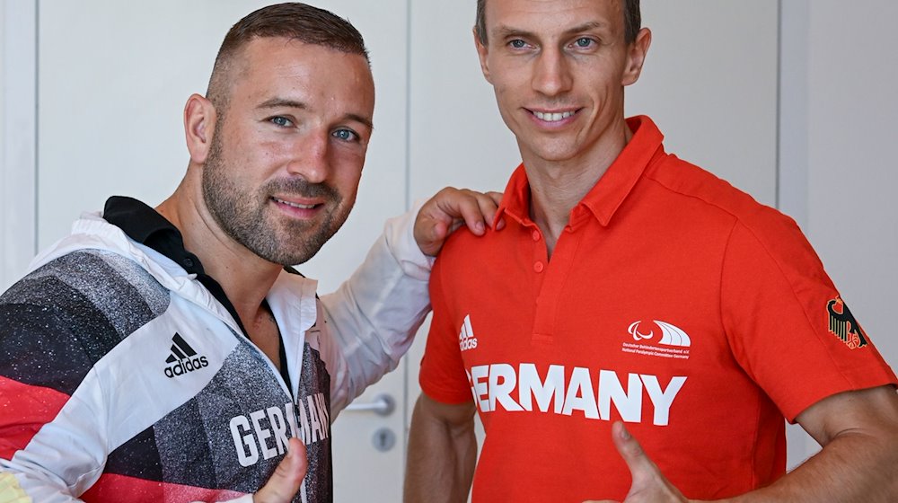 Die Radsportler Robert Förstemann (l) und Thomas Ulbricht. / Foto: Jens Kalaene/dpa